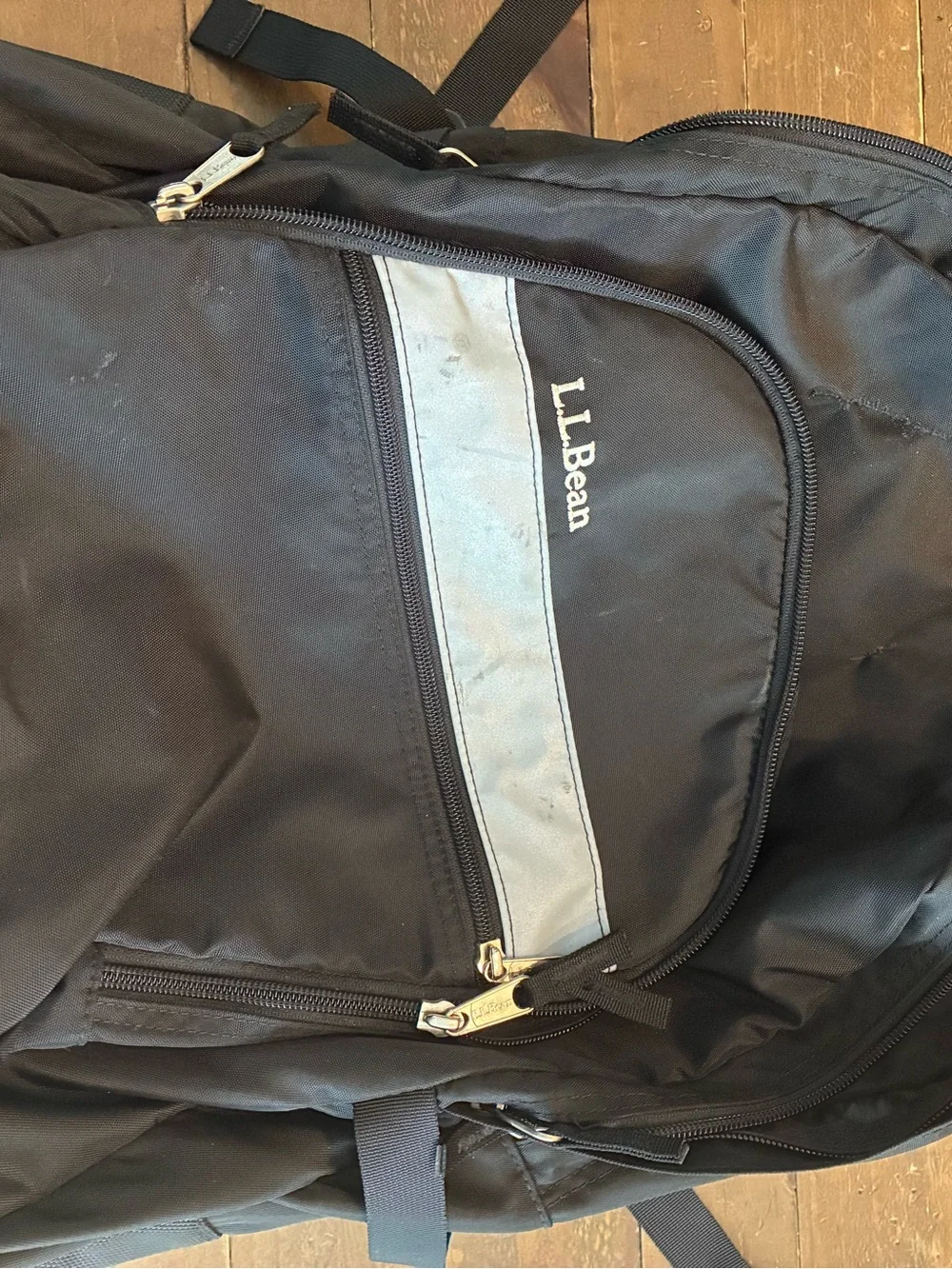 L.L. Bean Black Rolling Backpack with Silver Reflective Accent